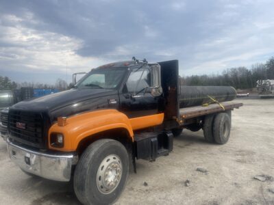 Black & Orange Flatbed Work Truck – Striking Industrial Film Vehicle