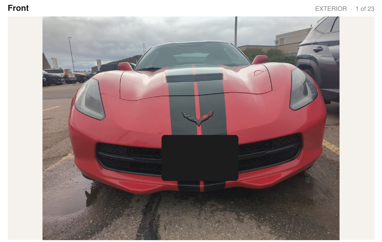 Inspection report page showing the front of a red Corvette, area 1 of 23, with the license plate covered